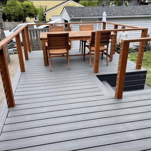 “Outdoor renovation in progress, including landscaping, patio, and deck updates